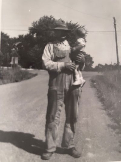 Grandpa Mertz and Denny early 1950's. This is at the intersection of Clayton Road and Henry Ave in Ballwin, MO.