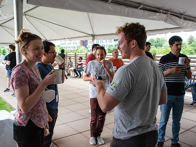 Danforth Center community members talking on the terrace at the Danforth Center